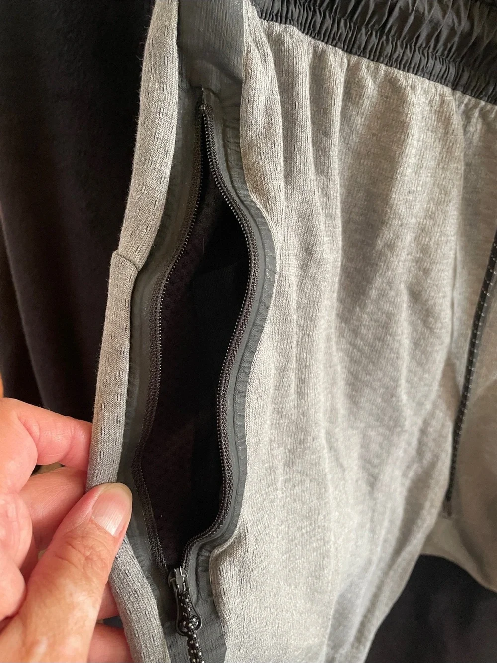 Nike Men's Gray Athletic Shorts with Black Waistband and Drawstring